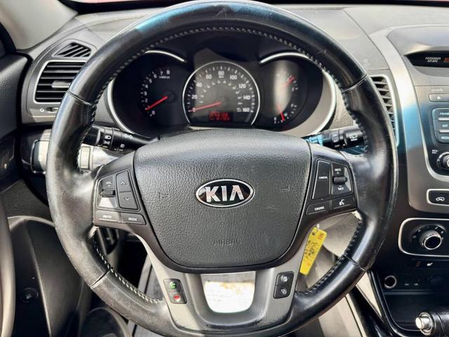 Photo of 2015 Remington Red Metallic Kia Sorento