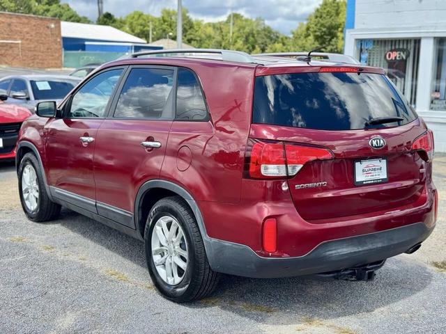 Photo of 2015 Remington Red Metallic Kia Sorento