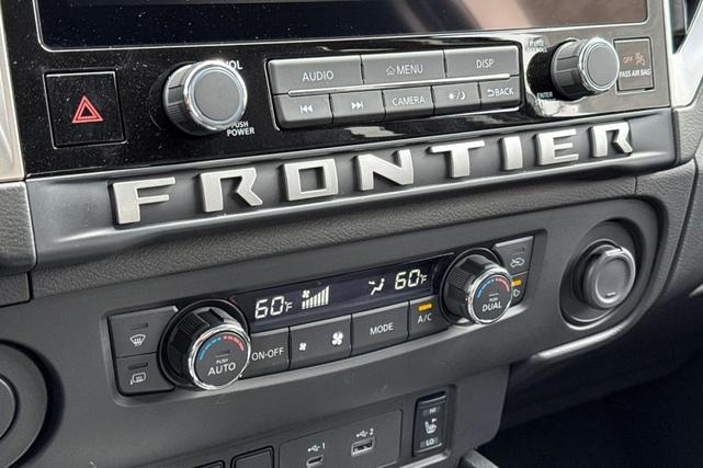 Photo of 2025 Glacier White Nissan Frontier