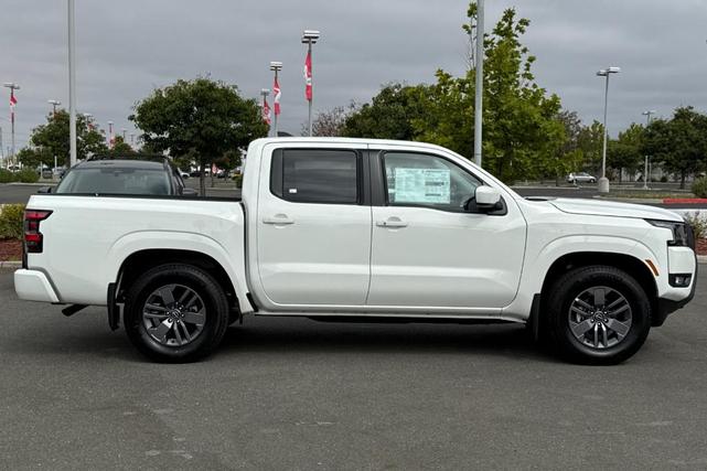 Photo of 2025 Glacier White Nissan Frontier