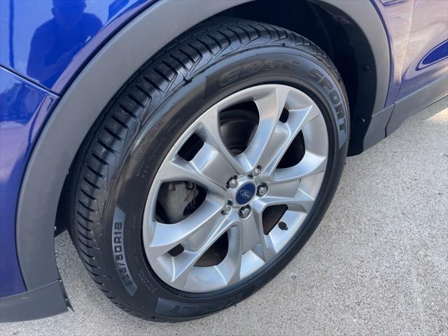 Photo of 2014 Deep Impact Blue Ford Escape