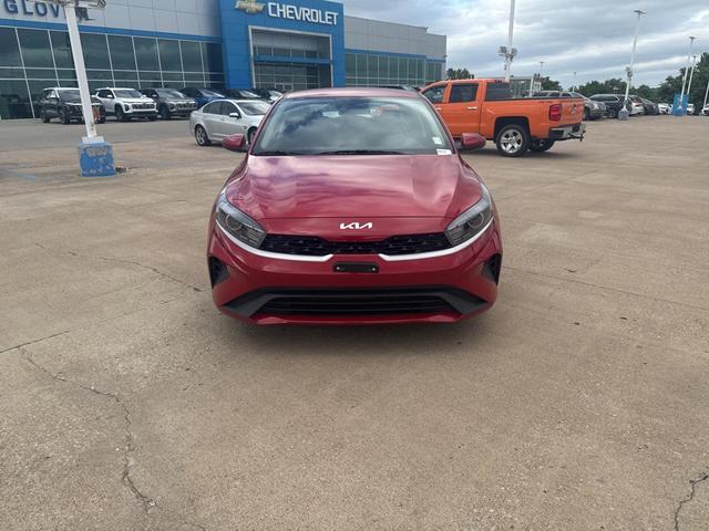 Photo of 2024 Currant Red Kia Forte