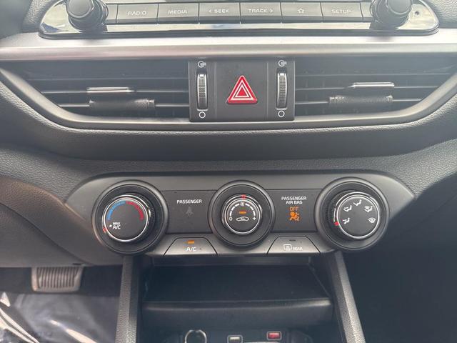 Photo of 2024 Currant Red Kia Forte