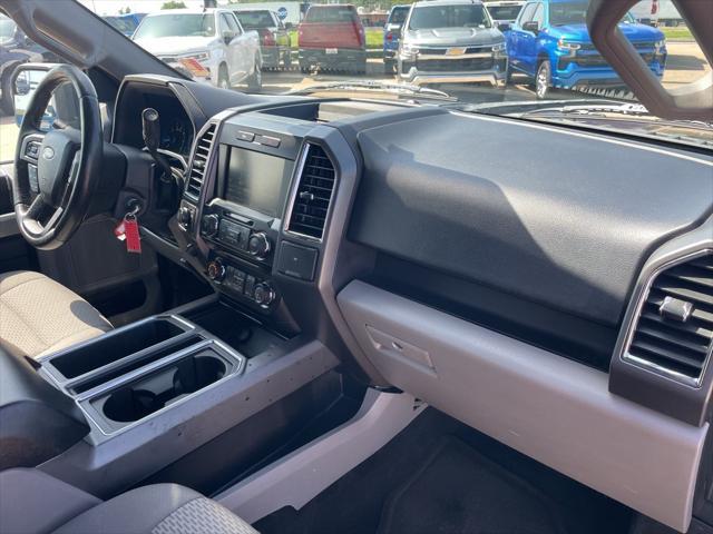 Photo of 2015 Ruby Red Metallic Tinted Clearcoat Ford F-150