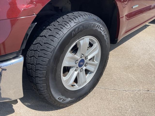 Photo of 2015 Ruby Red Metallic Tinted Clearcoat Ford F-150