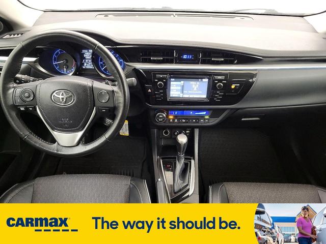 Photo of 2015 White Toyota Corolla