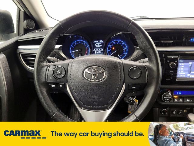 Photo of 2015 White Toyota Corolla