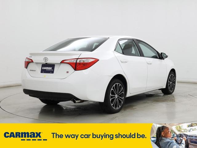 Photo of 2015 White Toyota Corolla