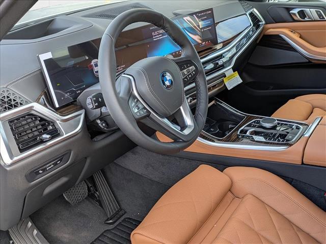 Photo of 2026 Mineral White Metallic BMW X5 PHEV