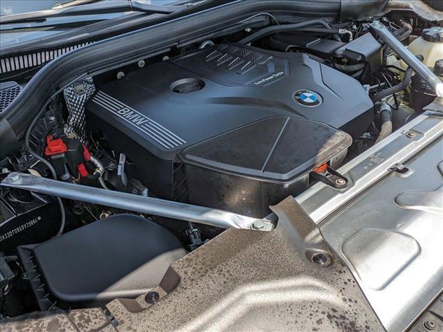 Photo of 2025 Black Sapphire Metallic BMW X4