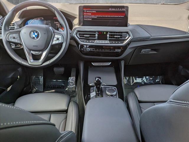 Photo of 2025 Black Sapphire Metallic BMW X4