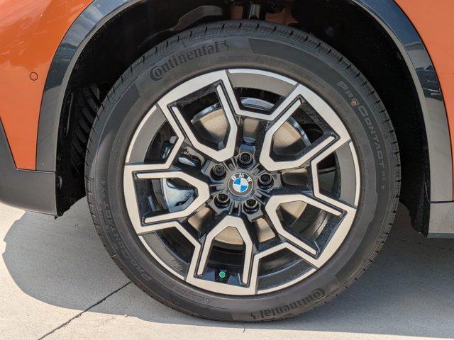 Photo of 2025 Orange Metallic BMW X1