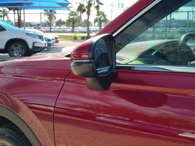 Photo of 2025 Radiant Red Metallic Honda CR-V