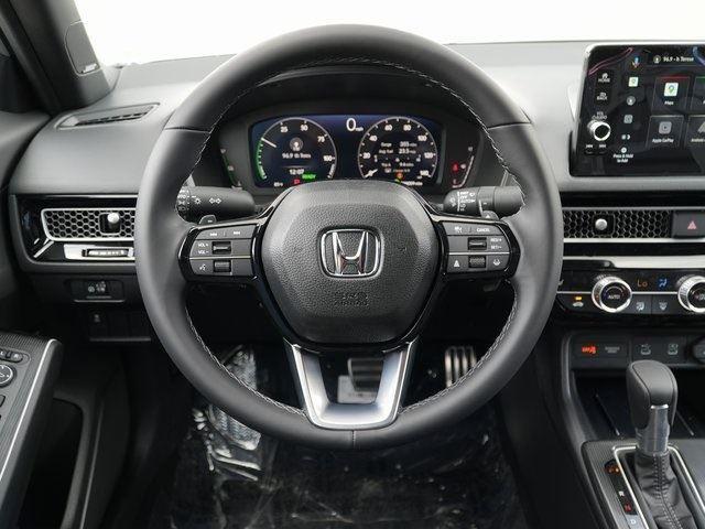 Photo of 2025 Solar Silver Metallic Honda Civic Hybrid