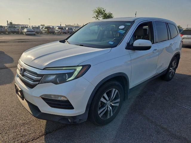 Photo of 2016 White Diamond Pearl Honda Pilot