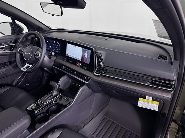 Photo of 2025 Jungle Green Kia Sportage