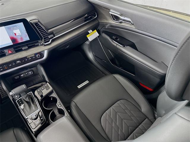 Photo of 2025 Jungle Green Kia Sportage