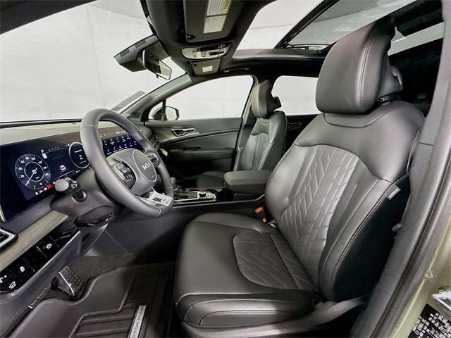 Photo of 2025 Jungle Green Kia Sportage