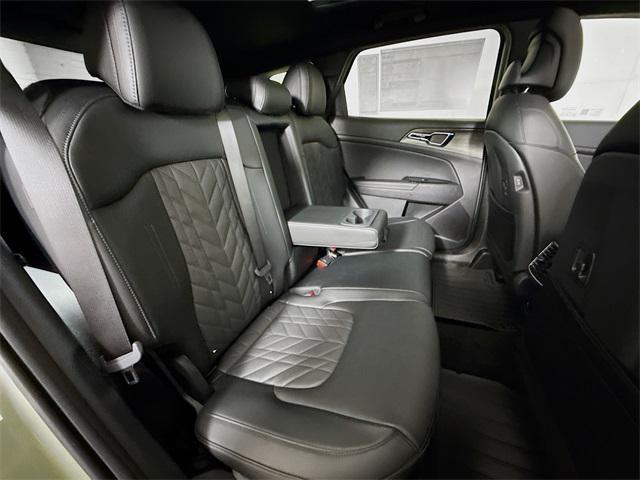 Photo of 2025 Jungle Green Kia Sportage