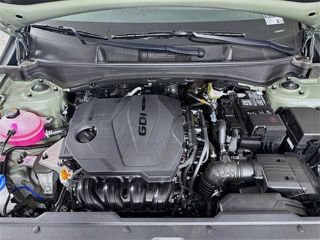 Photo of 2025 Jungle Green Kia Sportage