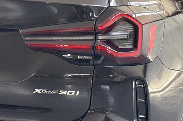 Photo of 2024 Black Sapphire Metallic BMW X3
