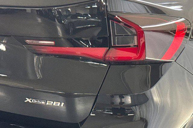 Photo of 2025 Black Sapphire Metallic BMW X1