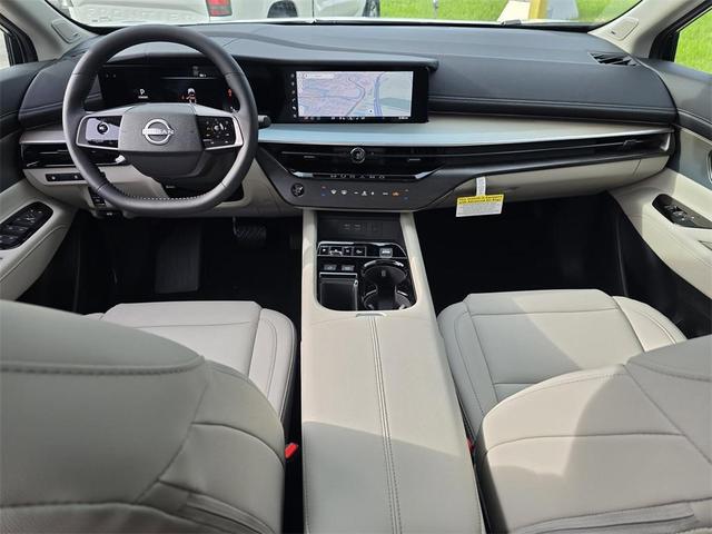 Photo of 2025 2t Red Blk Roof Nissan Murano