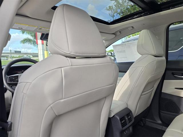 Photo of 2025 2t Red Blk Roof Nissan Murano