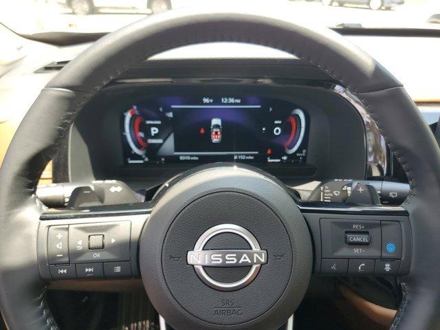 Photo of 2024 2t Tan Blk Roof Nissan Pathfinder