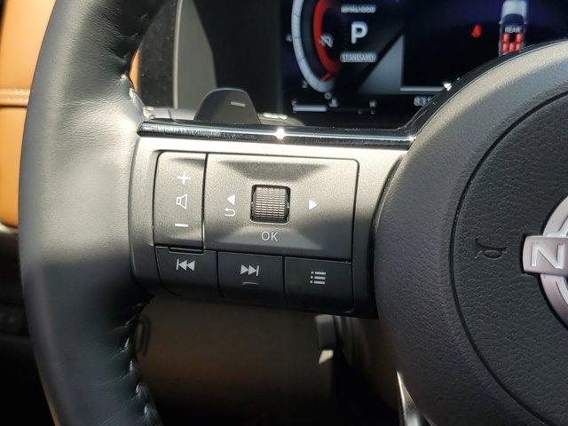 Photo of 2024 2t Tan Blk Roof Nissan Pathfinder