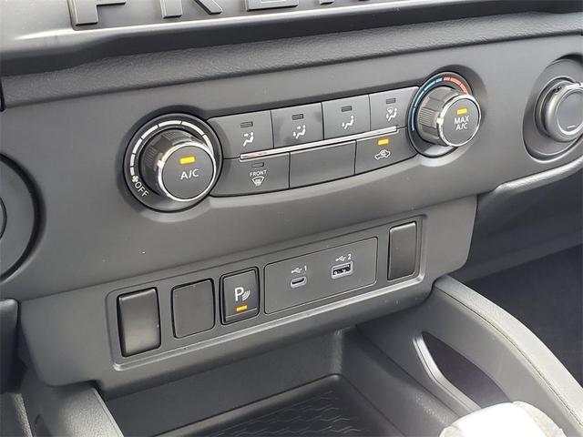 Photo of 2026 Glacier White Nissan Frontier