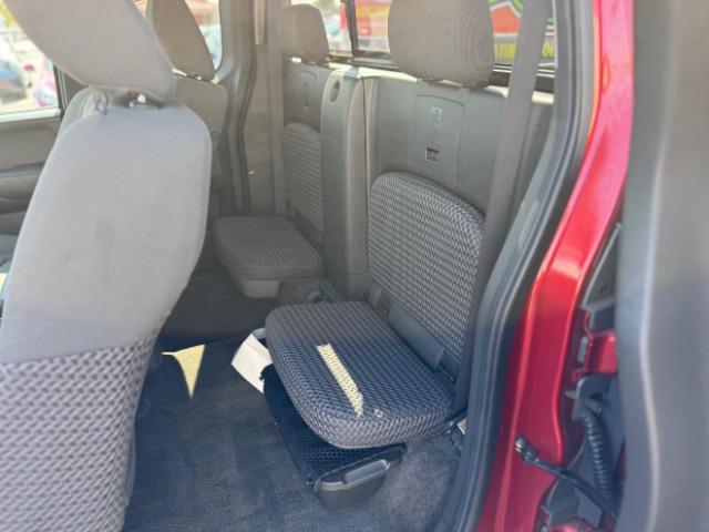 Photo of 2012 Lava Red Nissan Frontier