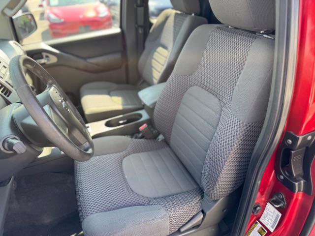 Photo of 2012 Lava Red Nissan Frontier