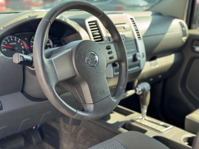 Photo of 2012 Lava Red Nissan Frontier