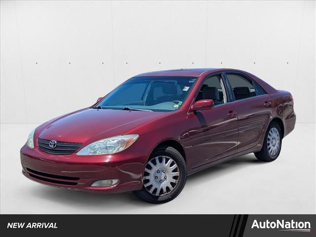 Photo of 2004 Salsa Red Pearl [R Toyota Camry