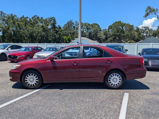 Photo of 2004 Salsa Red Pearl [R Toyota Camry