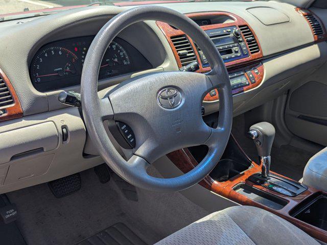 Photo of 2004 Salsa Red Pearl [R Toyota Camry