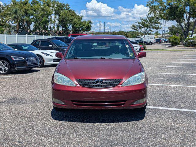 Photo of 2004 Salsa Red Pearl [R Toyota Camry
