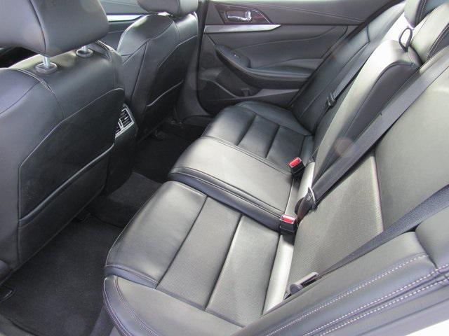 Photo of 2023 Pearl White Tricoat Nissan Maxima