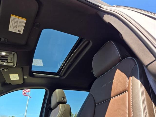 Photo of 2024 White Frost Tricoat GMC Sierra 1500