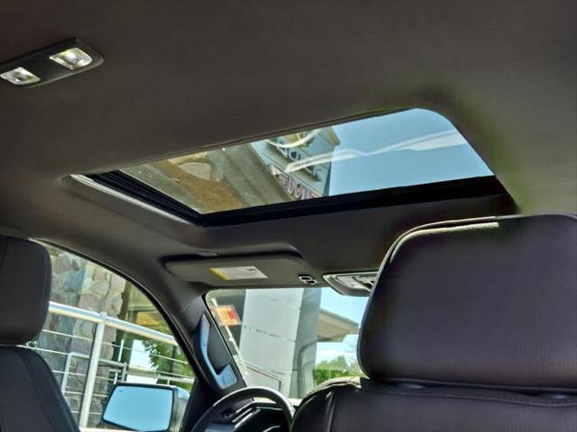 Photo of 2024 White Frost Tricoat GMC Sierra 1500