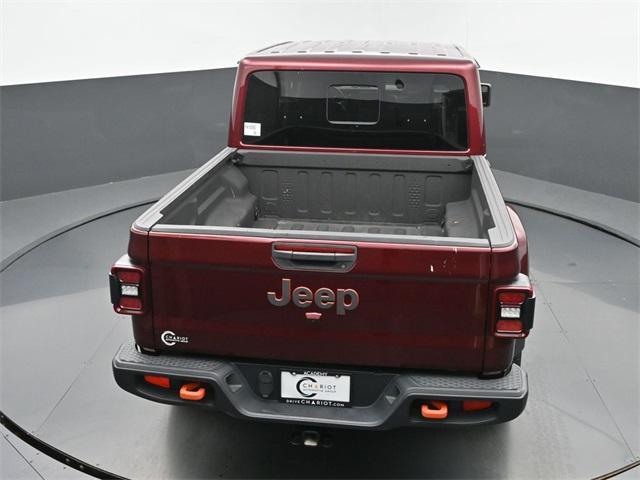 Photo of 2021 Snazzberry Pearlcoat Jeep Gladiator