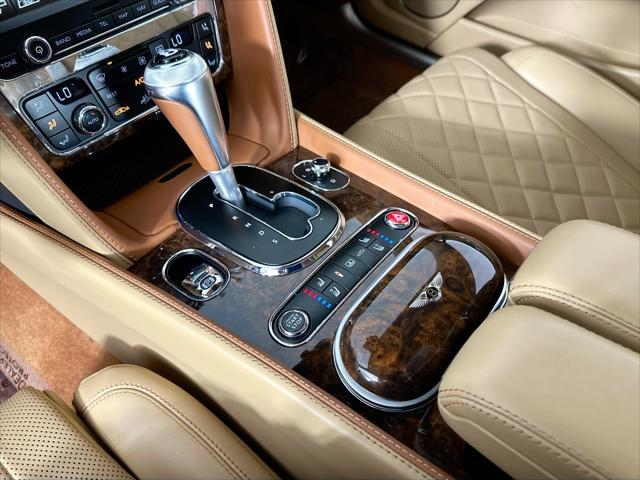 Photo of 2018 Red Metallic Bentley Flying Spur