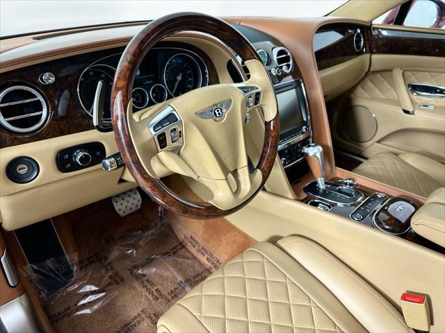 Photo of 2018 Red Metallic Bentley Flying Spur