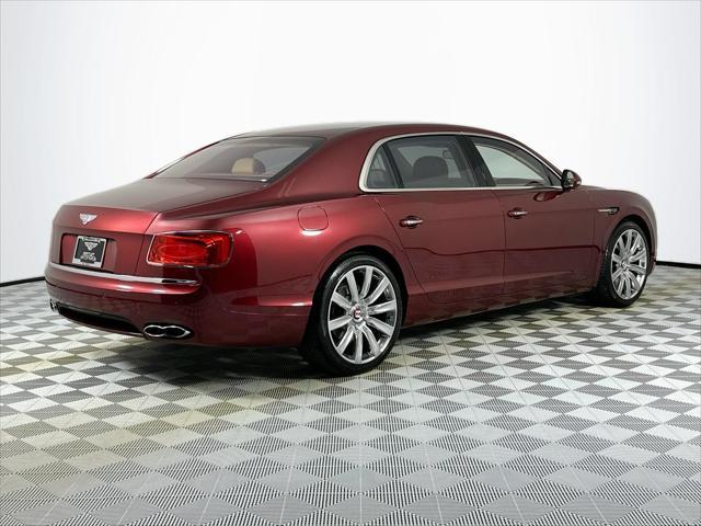Photo of 2018 Red Metallic Bentley Flying Spur