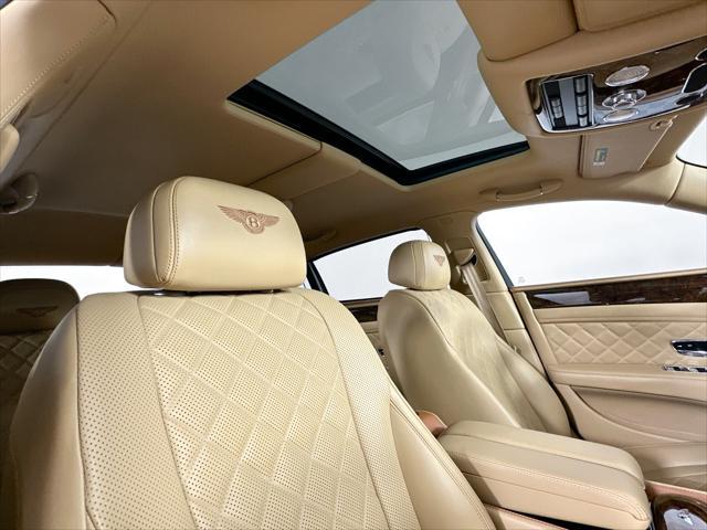 Photo of 2018 Red Metallic Bentley Flying Spur