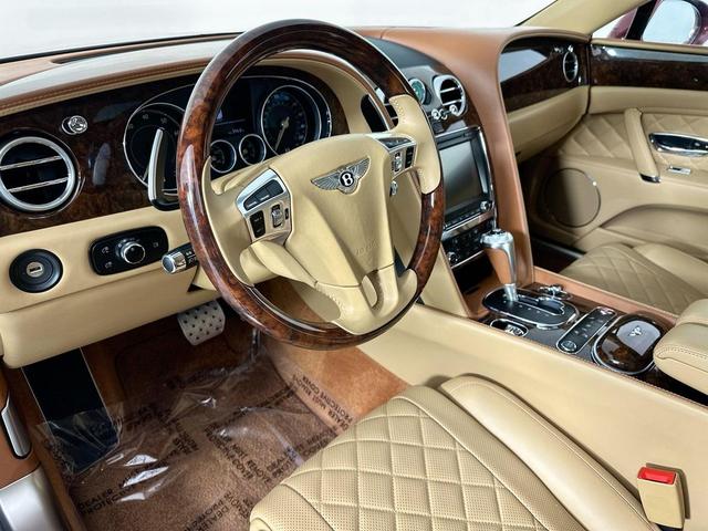 Photo of 2018 Red Metallic Bentley Flying Spur