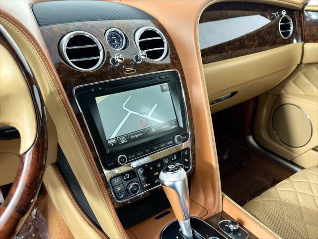 Photo of 2018 Red Metallic Bentley Flying Spur