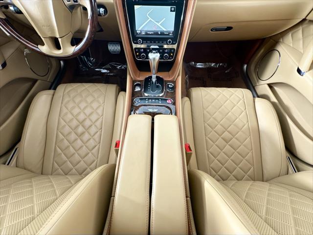 Photo of 2018 Red Metallic Bentley Flying Spur