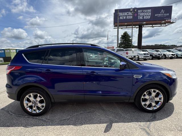Photo of 2014 Deep Impact Blue Ford Escape